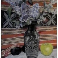 	 Still life with lilac flowers, apple and sunglasses